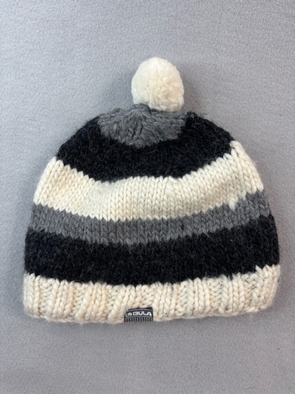 BULA Gorpcore Wool Blend Striped Pom Knit Beanie - Black, Gray & Cream